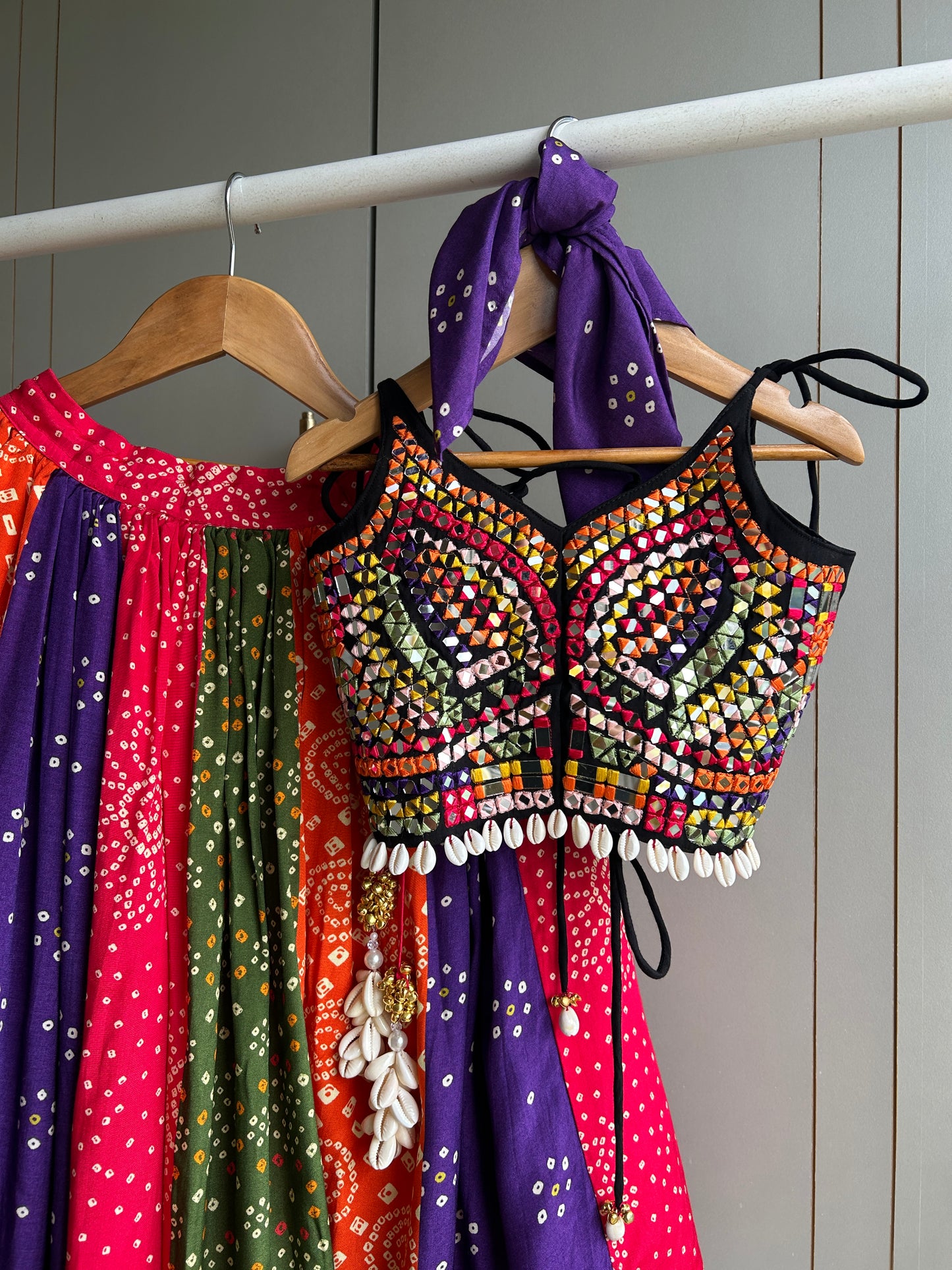 Black strappy top with multicolour thread and mirror hand embroidery