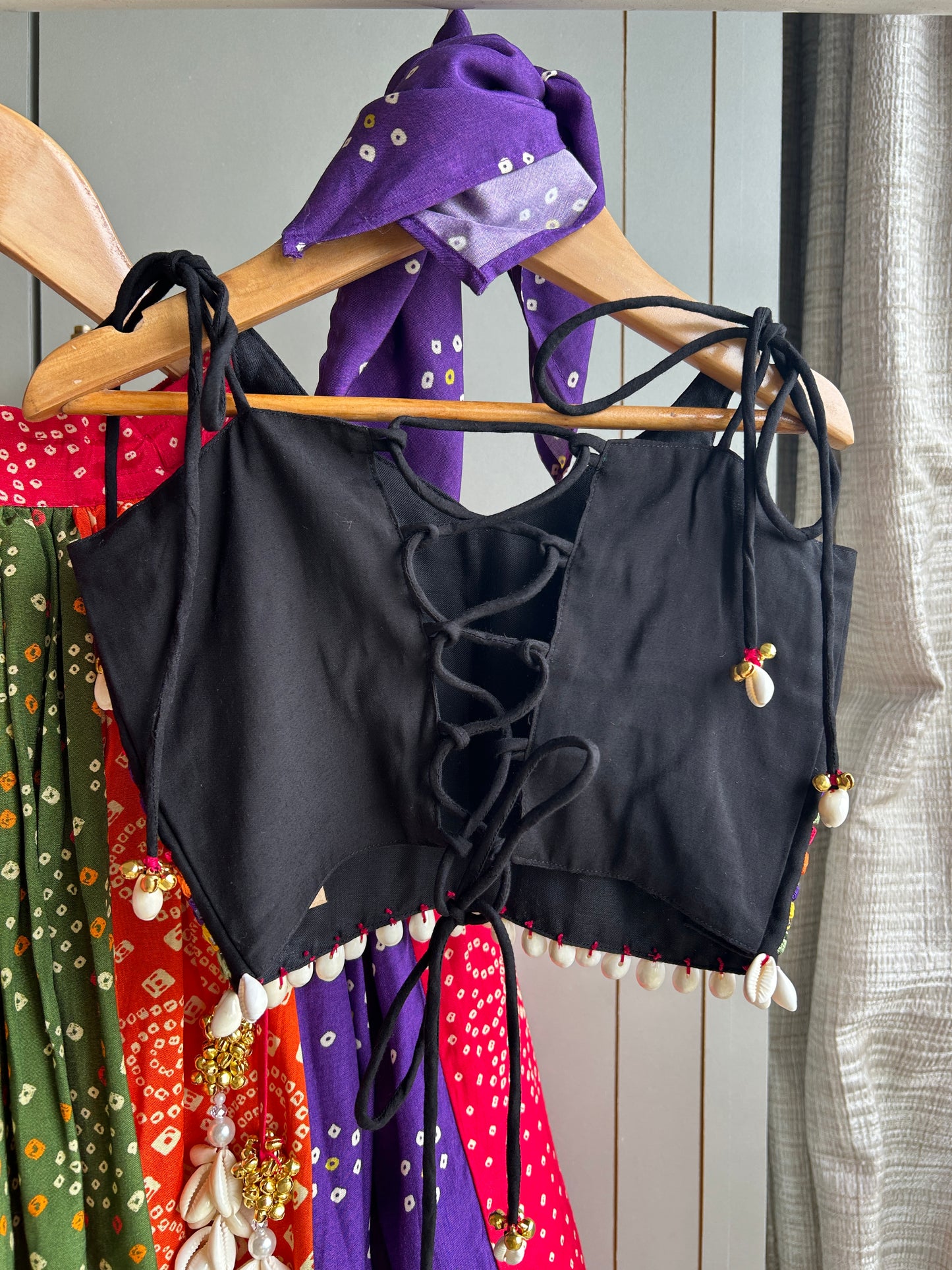 Black strappy top with multicolour thread and mirror hand embroidery