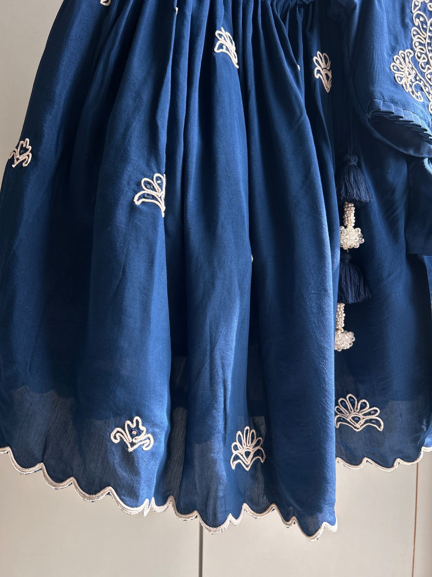 Blue Nelumbo Dori Embroidered Top And Fringe Tassel Enhanced Lehenga