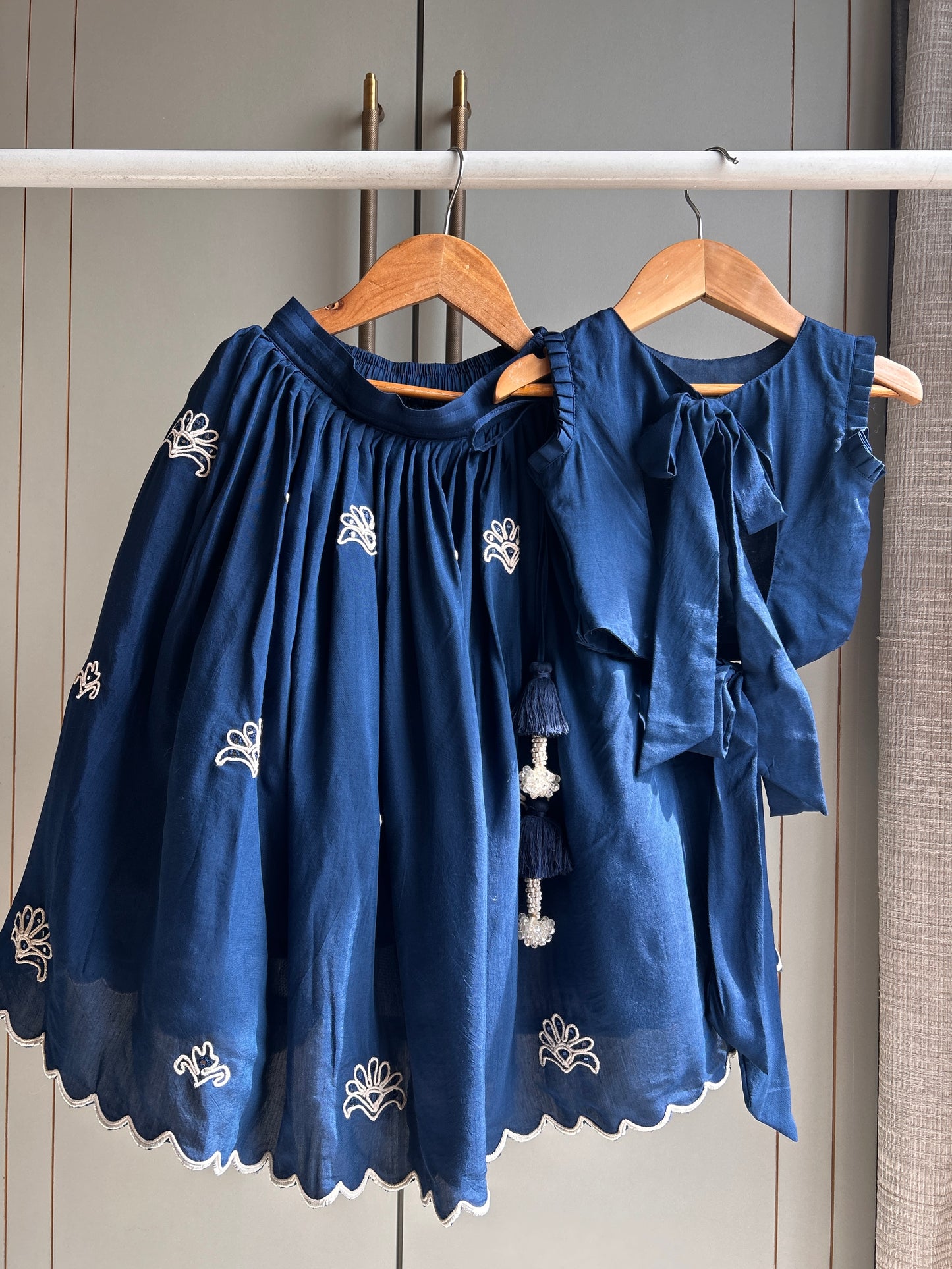 Blue Nelumbo Dori Embroidered Top And Fringe Tassel Enhanced Lehenga