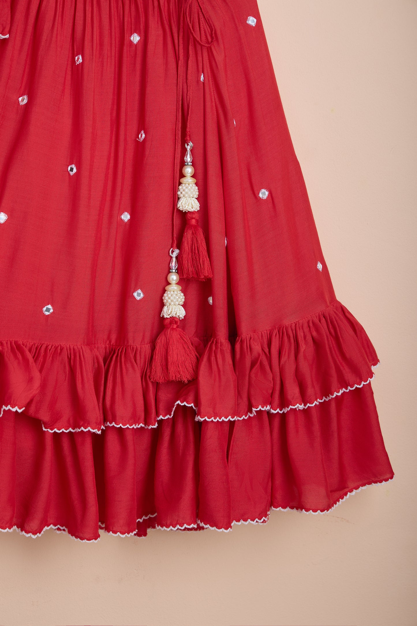 Bani Embroidered Red Top And Pleated Frilly Hem Lehenga