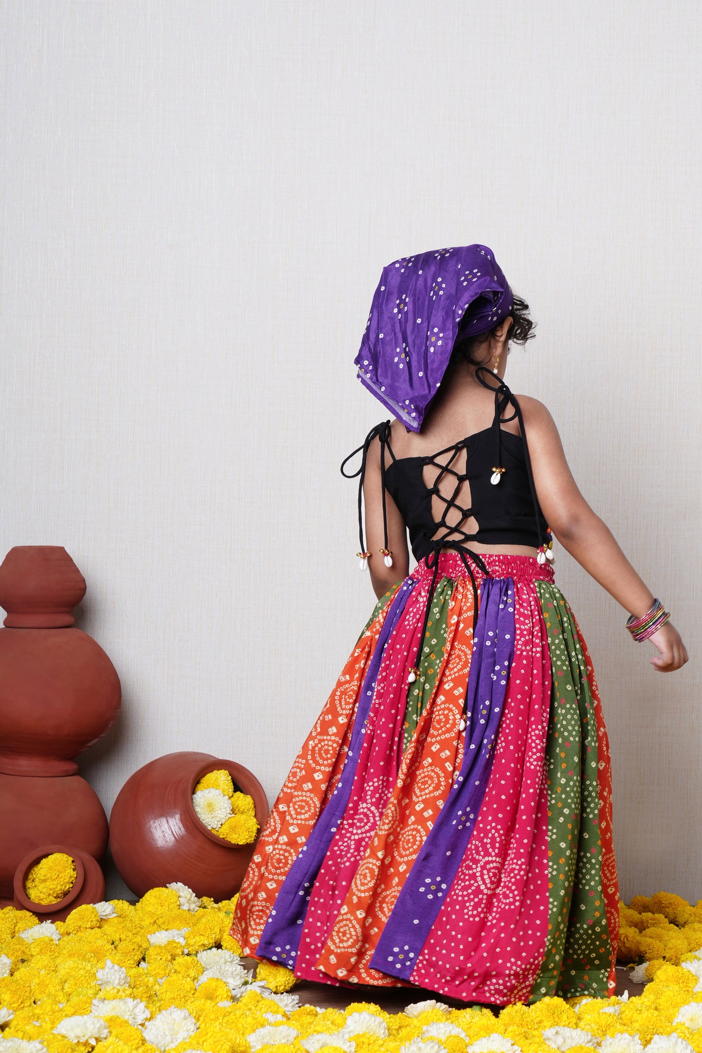 Black strappy top with multicolour thread and mirror hand embroidery